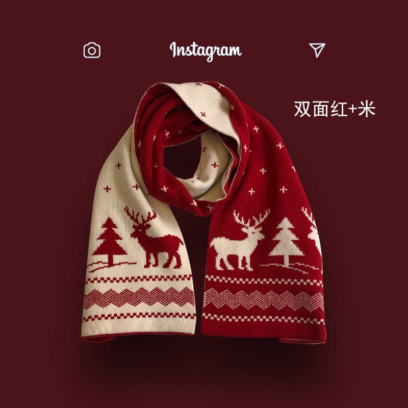 Reversible red and cream knitted winter scarf featuring reindeer, pine trees, and Nordic Fair Isle pattern displayed on dark red background