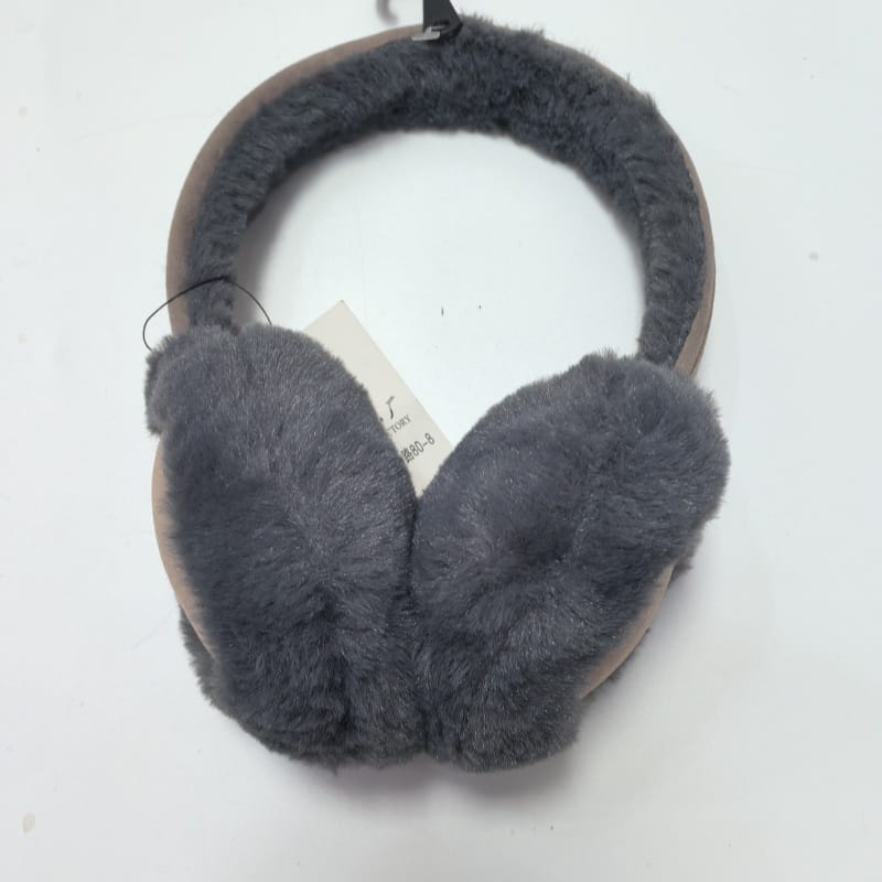 Beige plush earmuffs shaped like cartoon horse or pony faces with small ears, black eyes, and soft fuzzy headband