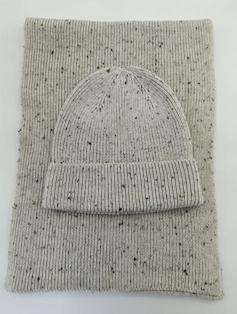 Light grey speckled ribbed knit beanie hat and matching rectangular scarf set laid flat on white background