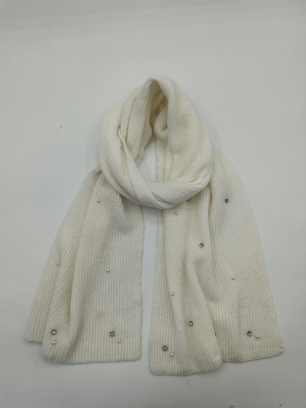 Cream ribbed knit scarf looped elegantly, decorated with scattered pearl and rhinestone embellishments on white background