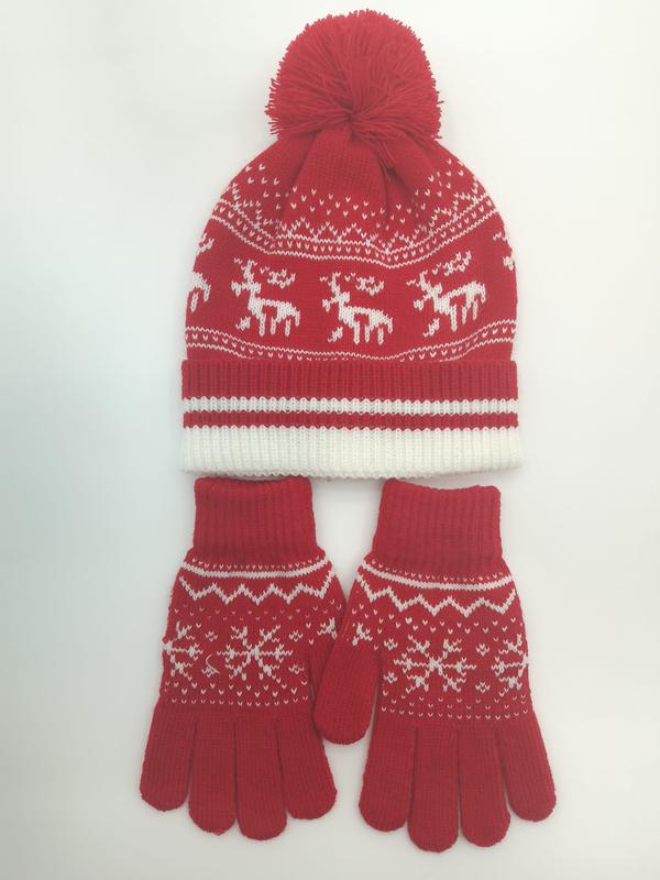 Red and white Fair Isle knit winter beanie hat with pom-pom and matching gloves featuring reindeer pattern