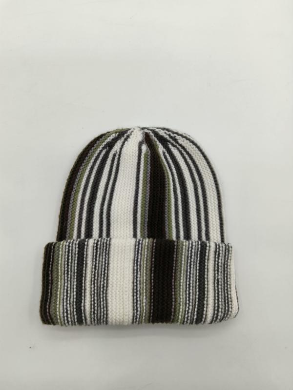 Multicolor striped ribbed knit beanie hat in white, black, and olive green with folded cuff, flat lay on white background